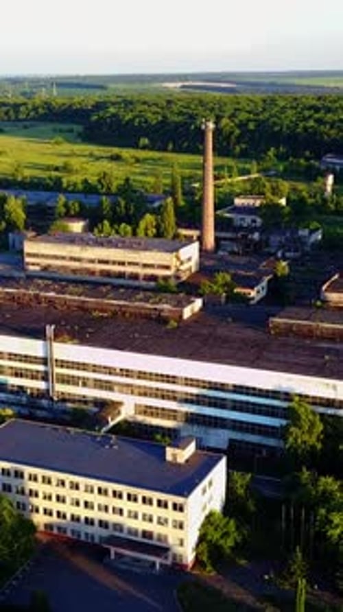 Old Abandoned Factory Buildings. Abandoned old factory buildings with closed door and windows