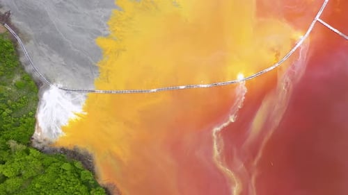 Aerial view of huge decanting lake, toxic mining residuals from a copper and gold mine cyanide leach