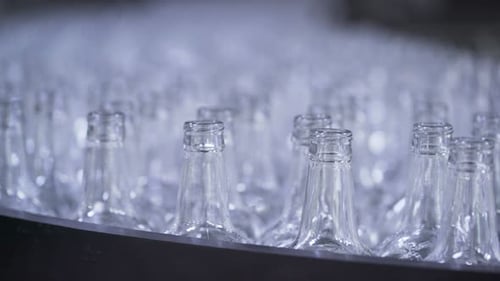 Automated Bottling Conveyor Belt in Factory