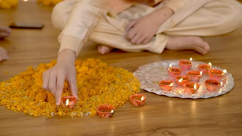 Burning Diyas and Flowers Arranged for Diwali Festival