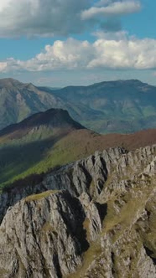 Rocky mountains and valley before sunset aerial
