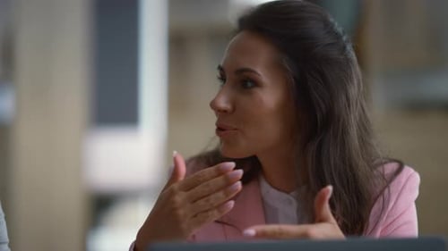 Businesswoman Talking Corporate Meeting In Financial Company Office. Young Female Executive Discu...