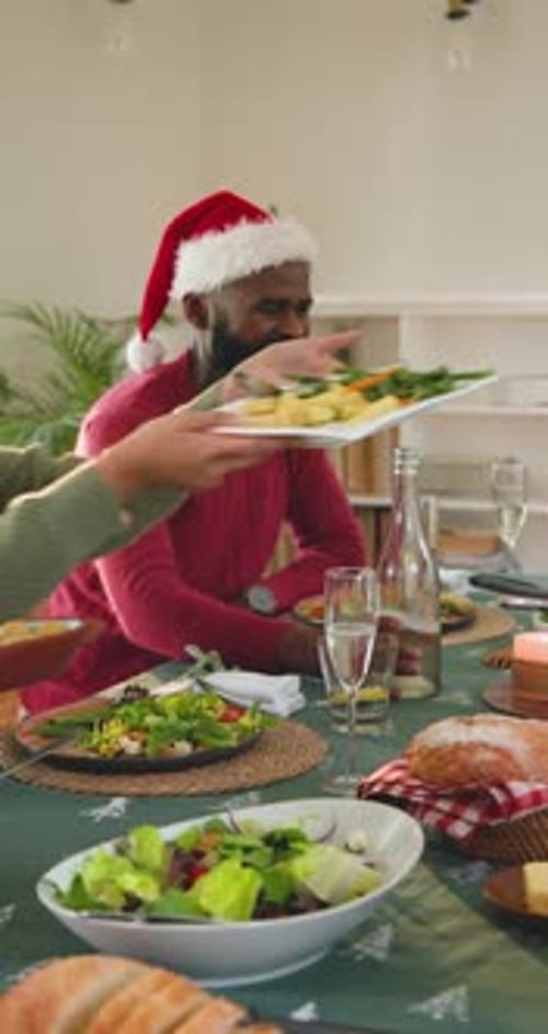 Family Enjoys Festive Christmas Dinner Together at Home