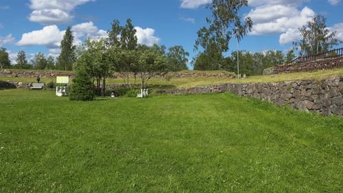 Anesthetic and refreshing view of greenfields and trees under the blue sky and clouds enhancing the