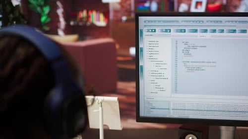 Close Up of Person Using Coding Application to Write and Test Code