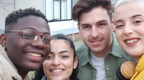 Diverse Young Student Friends Having Fun on Campus