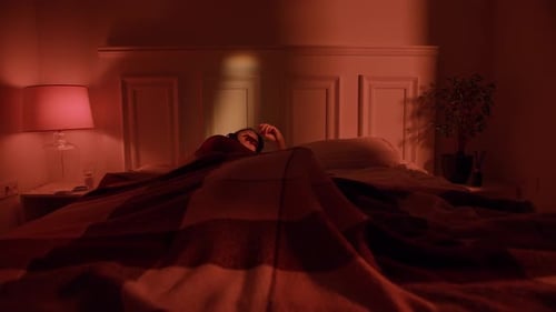 Girl Wakes up in Bed at Night