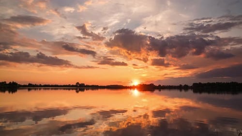 Timelapse of a Beautiful Sunset on the Lake Summer Landscape