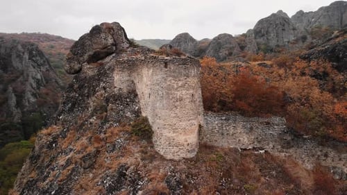 Old Tower Landscape Ancient Round Watchtower Amidst Rugged Mountain Scenery with Lichens