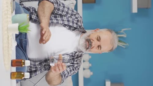 Vertical video of Tremor disease.