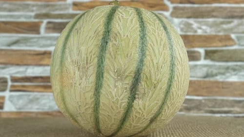 Close Up of a Cantaloupe on Burlap