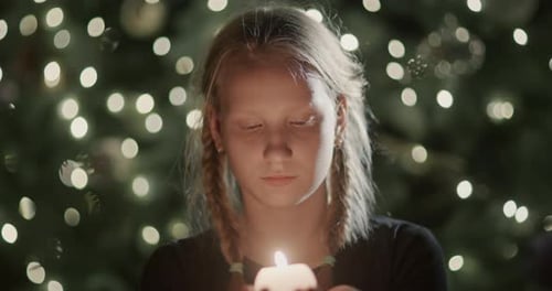 Portrait of a Child with a Candle in His Hands