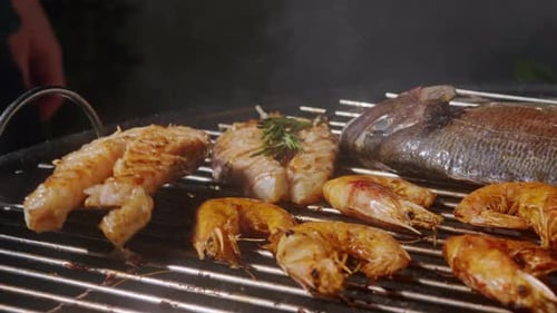 Chef Cooking Shrimps with Oil and Spices on Grill Closeup Prawns on Fire Throwing Them on Pan Dorado