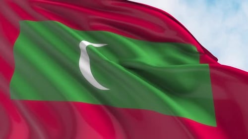 Realistic Waving Maldives National Flag on Blue Sky