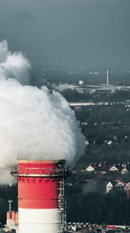 Industrial Chimney Emitting Steam