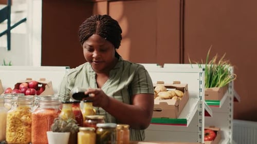 Woman Putting Pickled Vegetables in Bag at Store