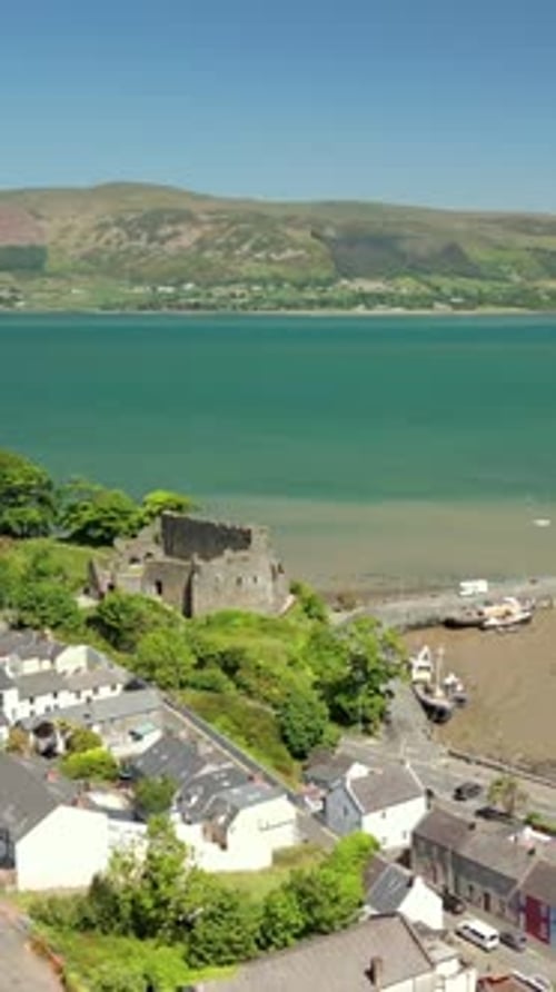 Retreating social ratio aerial video of Carlingford in County Louth, Ireland