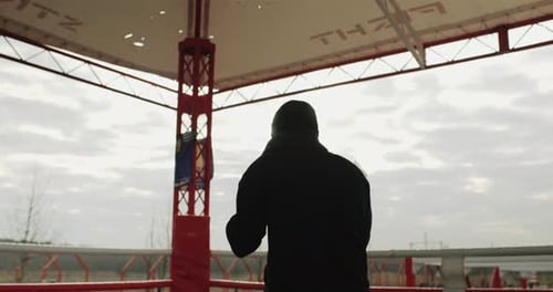 Boxer Training in Outdoor Boxing Ring