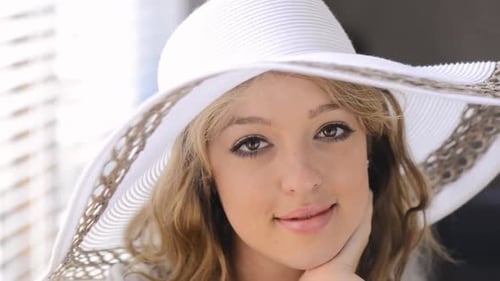 Smiling Woman with Hat Close-Up, Posing Indoors