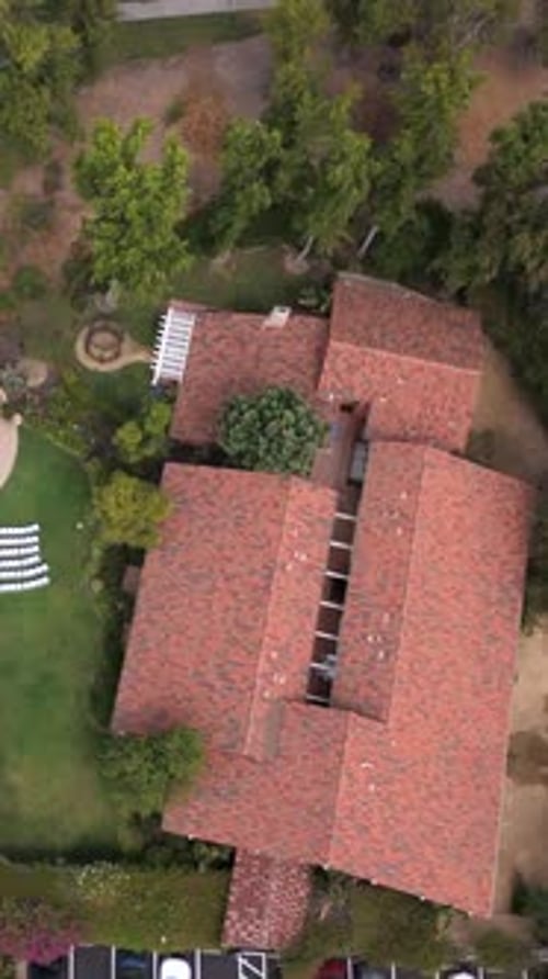 An Aerial View of a Stunningly Beautiful Wedding Venue Located Near a Scenic Golf Course