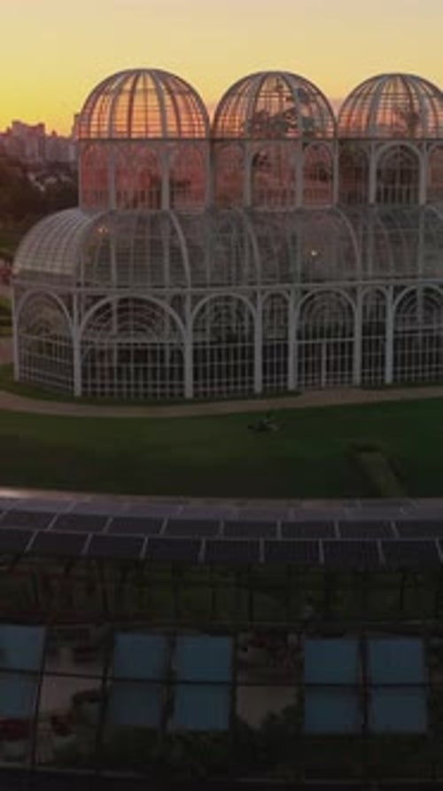 Golden sunset in Curitiba with Curitiba botanical garden and lush gardening landscape in Curitiba