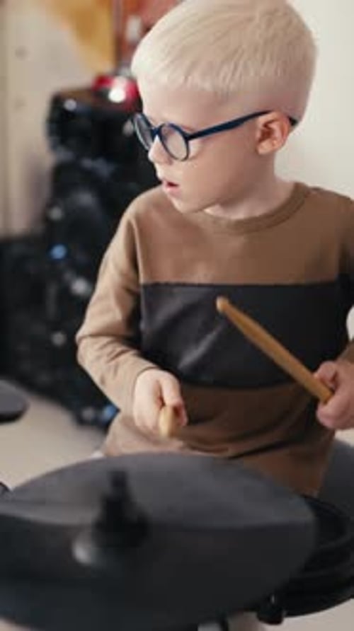 Boy With Glasses Playing Drums, Indoor