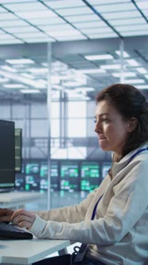 IT Technicians in Server Farm Brainstorming Ways to Repair Equipment