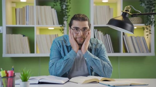 Bored and unhappy young college student.