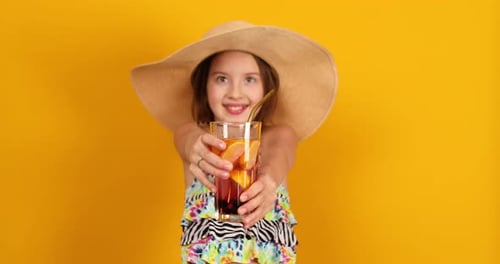 Smiling Girl Offers Refreshing Summer Drink