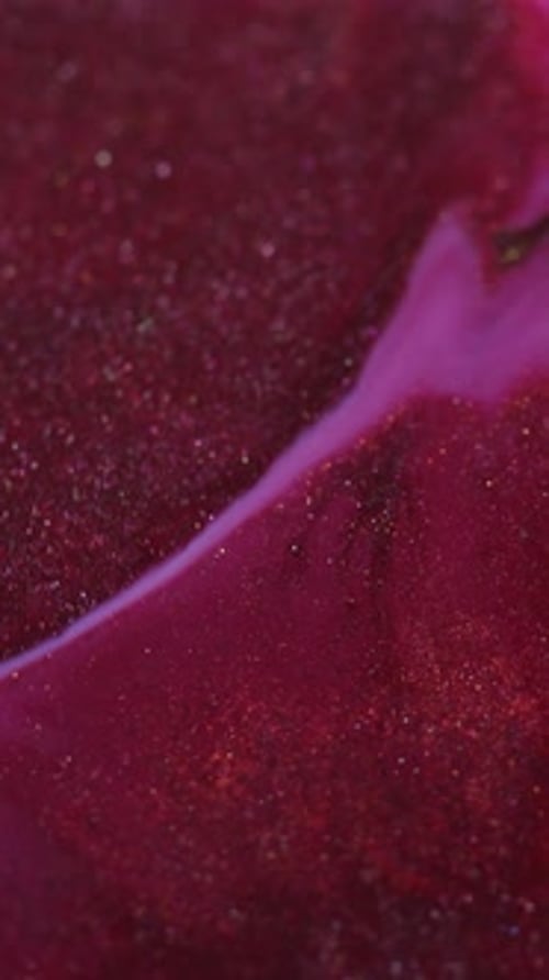 Fluid Movement of Pink and Red Liquid Background
