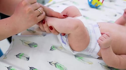 Baby Getting Leg Massage at Home
