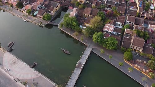 Aerial Top Down View of Old Heritage Houses Site Bridge and River in Hoi an Town