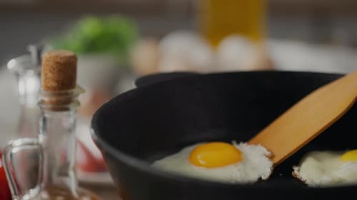 Fried Egg Cooking in a Pan, Close Up