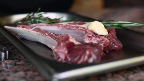 Raw Meat Prepared with Garlic, Rosemary, and Olive Oil
