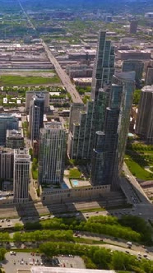 Modern abundant city panorama on sunny day. Beautiful Chicago scenery from aerial perspective