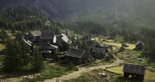 Pueblo rústico enclavado en un paisaje montañoso durante la Hora Dorada