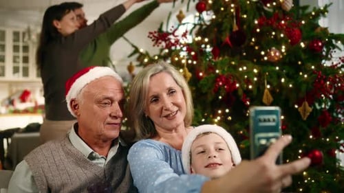 Family Celebrates Christmas and Takes a Selfie