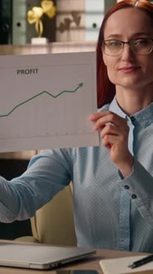 Successful Caucasian Business Woman Holding Paper Growth Chart Finance Documents Indoor Office