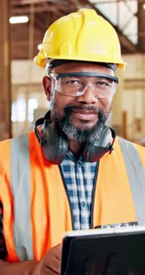Black man, portrait and carpenter with tablet in workshop for wood construction or maintenance