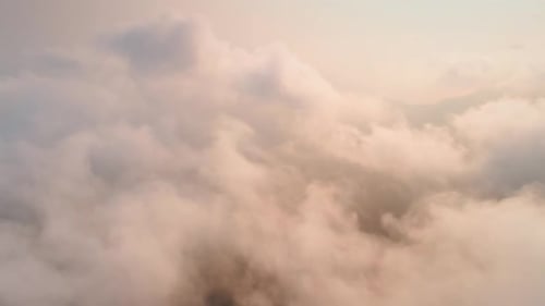 Aerial drone shot of clouds at golden hour