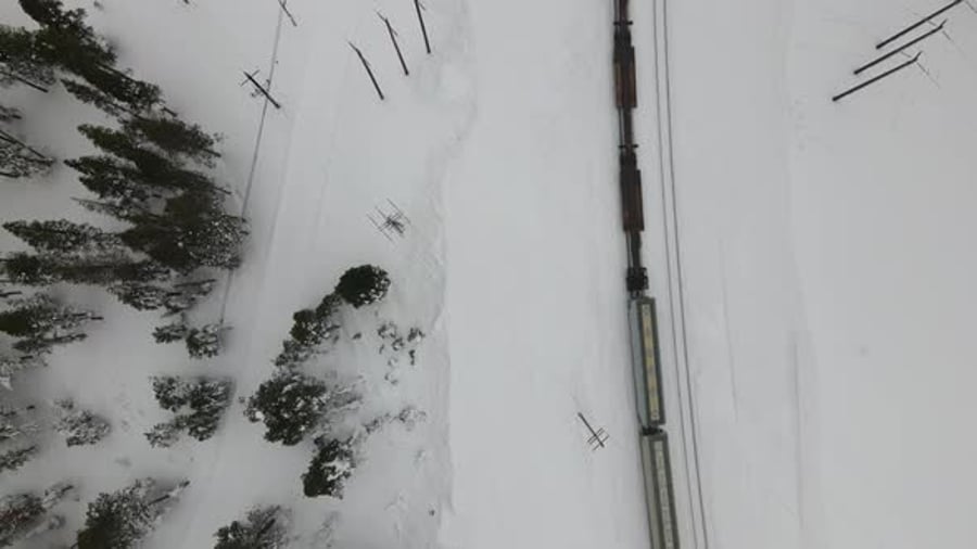 Cover for 4K Topdown Drone Shot of Train in Snow