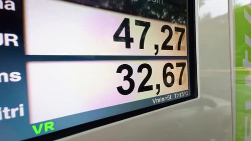 A Detailed Gas Station Price Display Showcasing Current Fuel Rates in Stunning Resolution