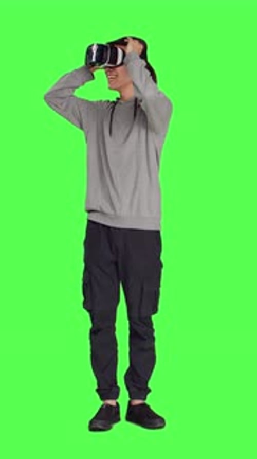 Front View of Young Guy Uses Virtual Reality Tech