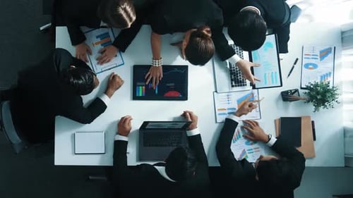 Top view of business people brainstorm marketing idea at table. Directorate.