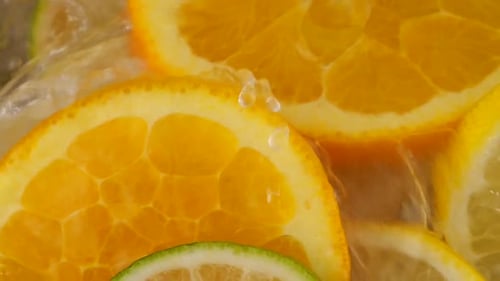 Fruit Slices Submerged in Refreshing Water