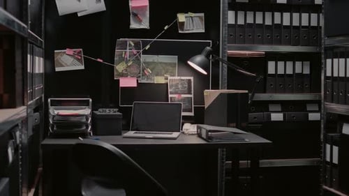 Detective's Office Desk Covered in Case Files