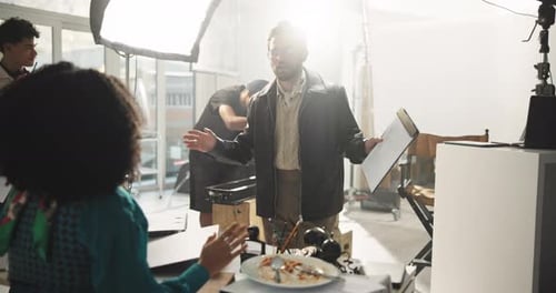 Team Collaborating in Modern Office with Natural Light