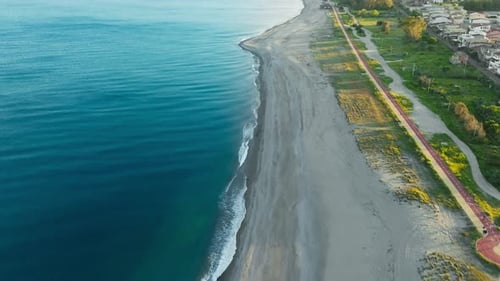 Sunlight Covering The Whole Coastlie Aerial
