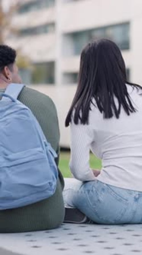 Diverse Group of College Students Relaxing on Campus Vertical