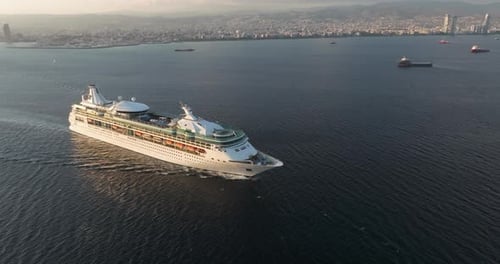 Aerial View of a Cruise Ship with Tourists in the Open Sea